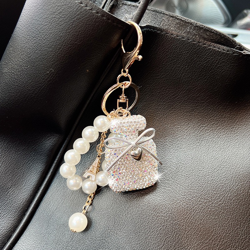 Style coréen bouteille de parfum porte-clés brillant strass arc charme Bling cristal sac pendentif mode voiture porte-clés cadeau pour femmes fil