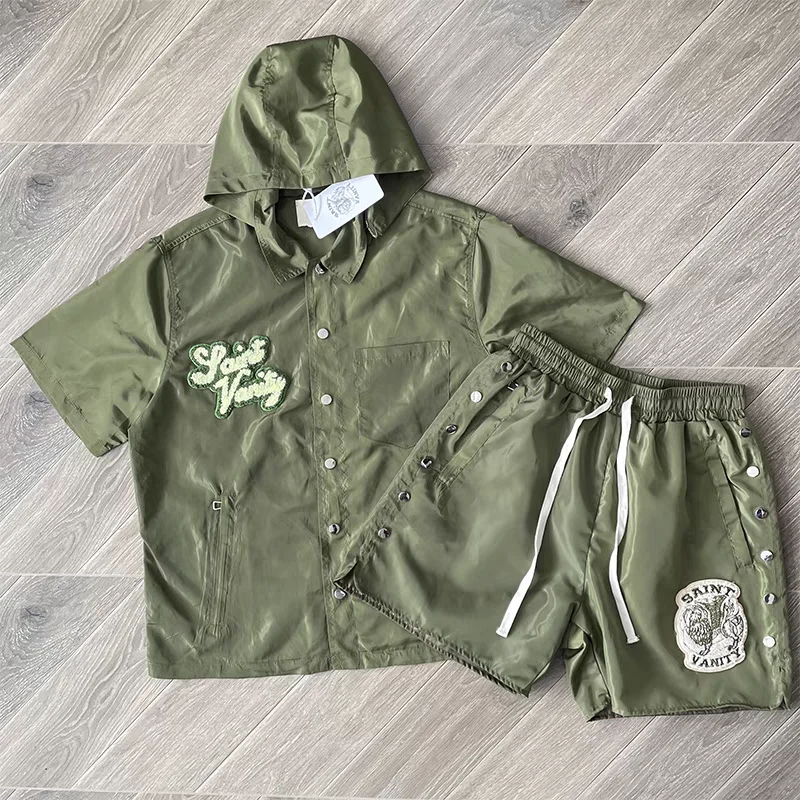 Saint Vanity windjackset geborduurd met capuchon korte mouw casual sportief trainingspak voor heren en dames jas met knopen en trekkoord broek