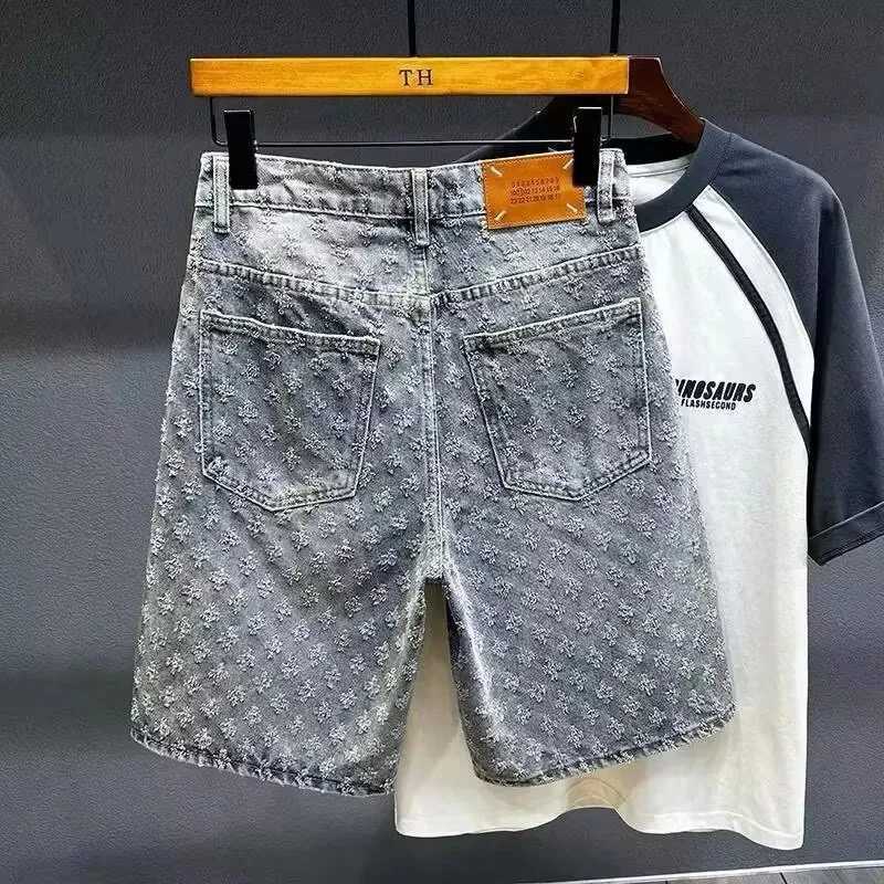 2025 American style new denim shorts for men in summer loose straight tube perforated jacquard high-end feeling five pointT260310