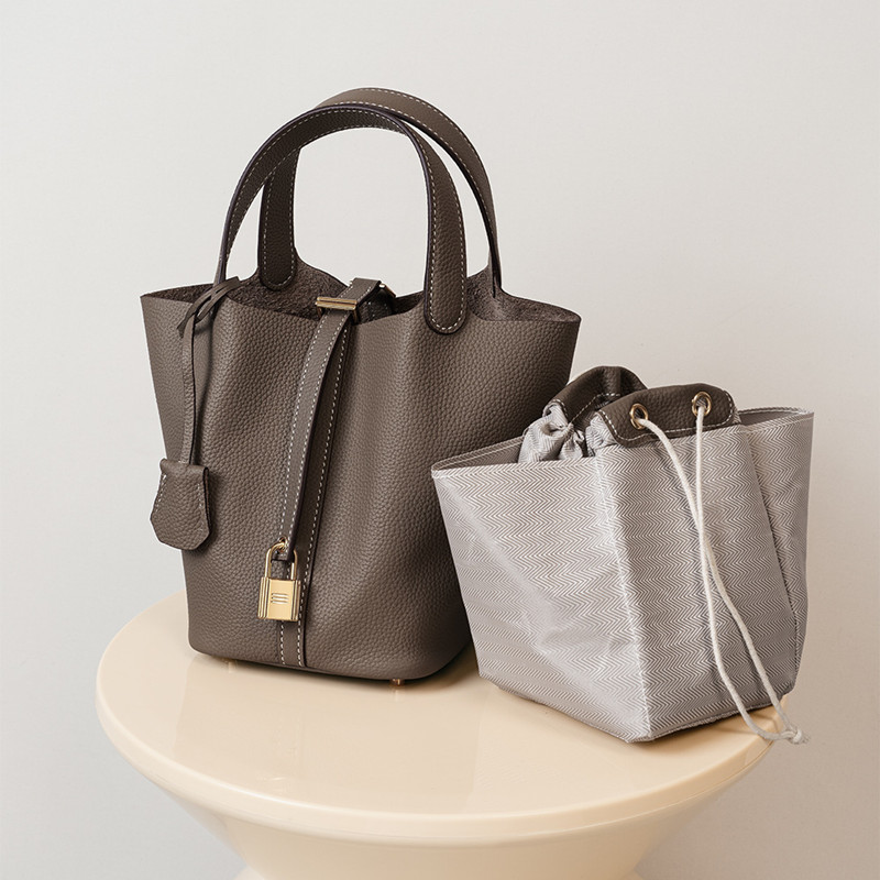 2026 New Fashion Sell Well cologne In Buckets Leather Shopping Baskets Mommy Bridal perfume Bags Luxury Handbags Factory Outlet Designer