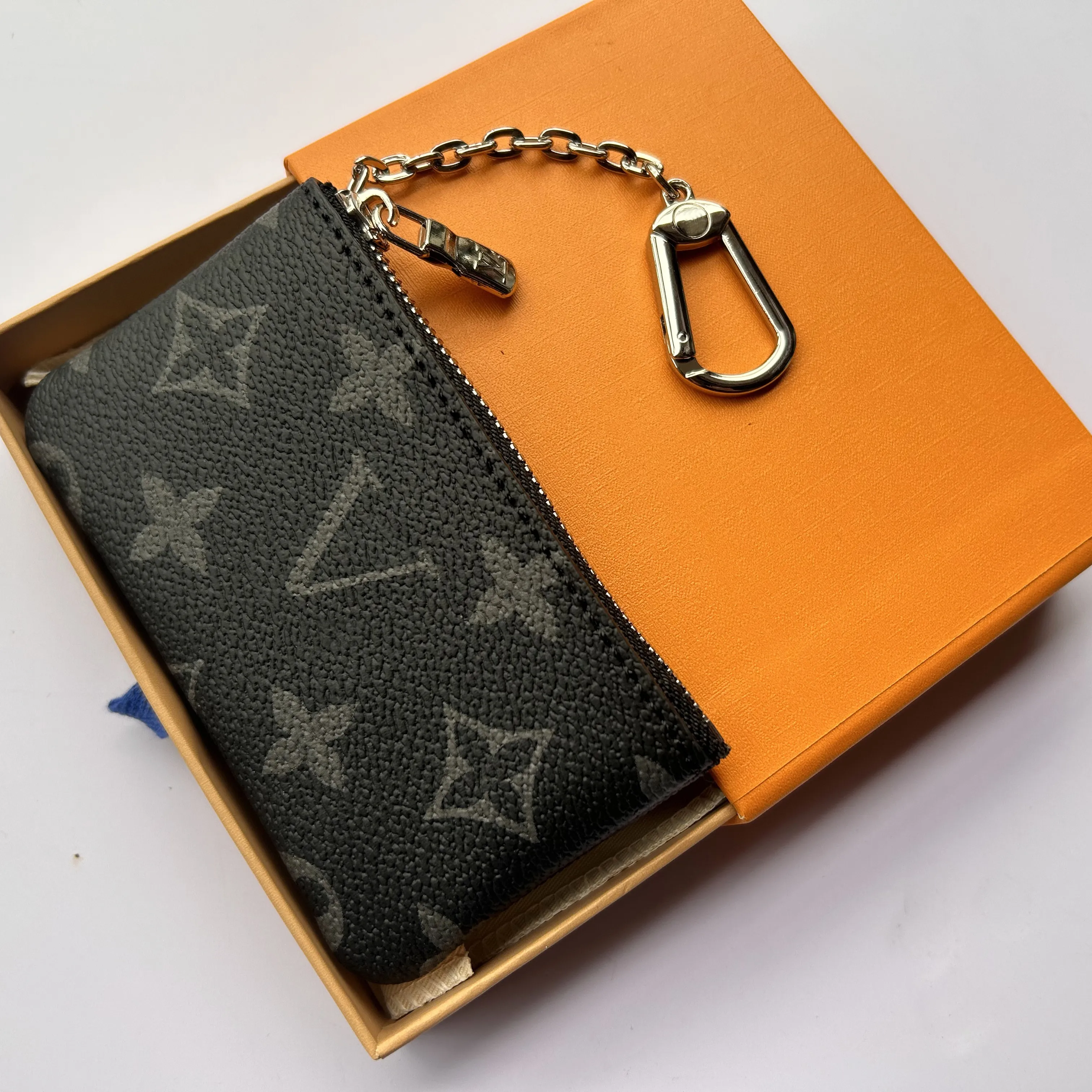 Designers Luxurys Sacs à main Clé Pochette Pochette CLES Femmes Hommes Porte-clés Porte-carte de crédit Porte-monnaie Mini Portefeuille Sac