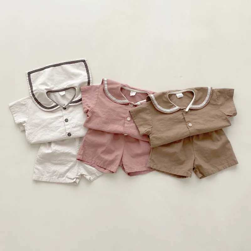 2024 Enfants Été Mode Ensemble Doux Bébé Fille Solide Col Marin Manches Courtes Hauts Et Enfant Garçon Lâche Simple Coton ShortsT260316