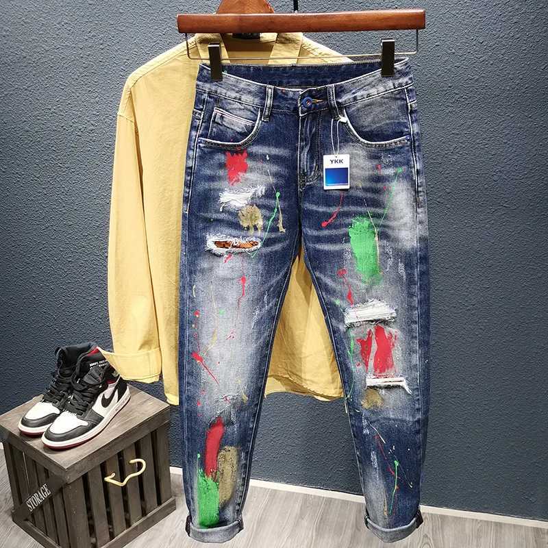Mens Graffiti Jeans Fashion Spray Paint Ripped Hole Personality Hip-hop Streetwear Male Clothing Slim Youth Denim TrousersT260316