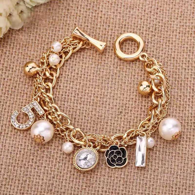 Accessoires de luxe multicouches en perles de camélia, fleur numéro 5, chaîne à main en métal populaire européen, bijoux H260318