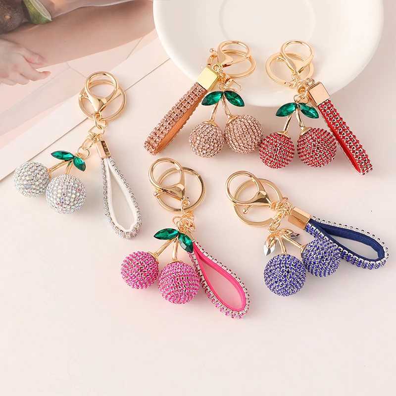 2025 New Cherry KeyChain Claw Chain Craft Full Crystal Rhinestone Womens Luxury Bags Pendant Souvenir Gifts for Family Friend H260318