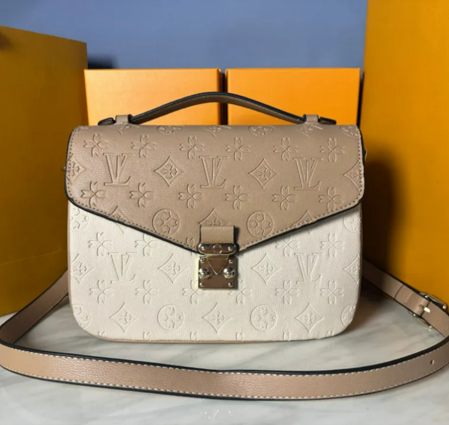 Sac de créateur Femmes Messenger Sac de voyage Style classique Sacs de mode Épaule Lady Totes Sacs à main avec serrure à clé Fourre-tout Sac à ba