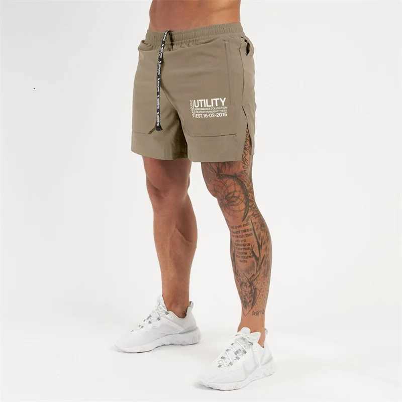 2026 New Mens Shorts Quick Drying Breathable Stretch Quarter Pants Jogger Gym Exercise Fitness ShortsT260319-image-1098324946