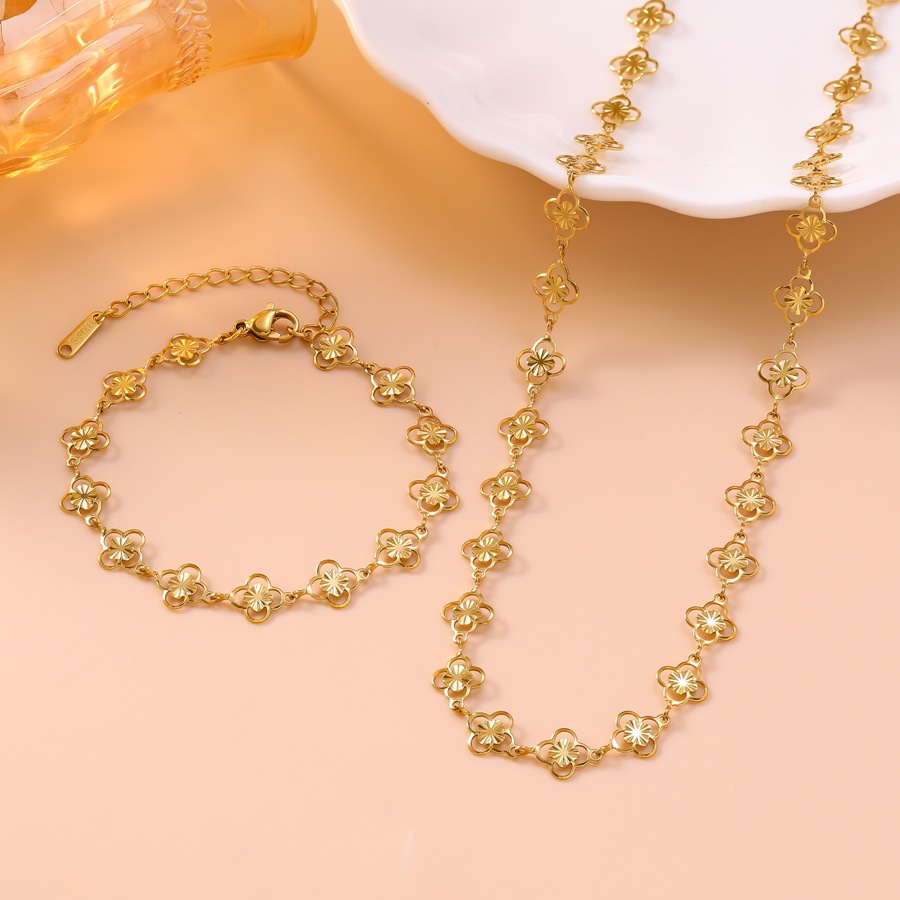 Hollow-carved leaf clover bracelet and necklace set for women, 18K gold stainless steel jewelry-image-1098507345
