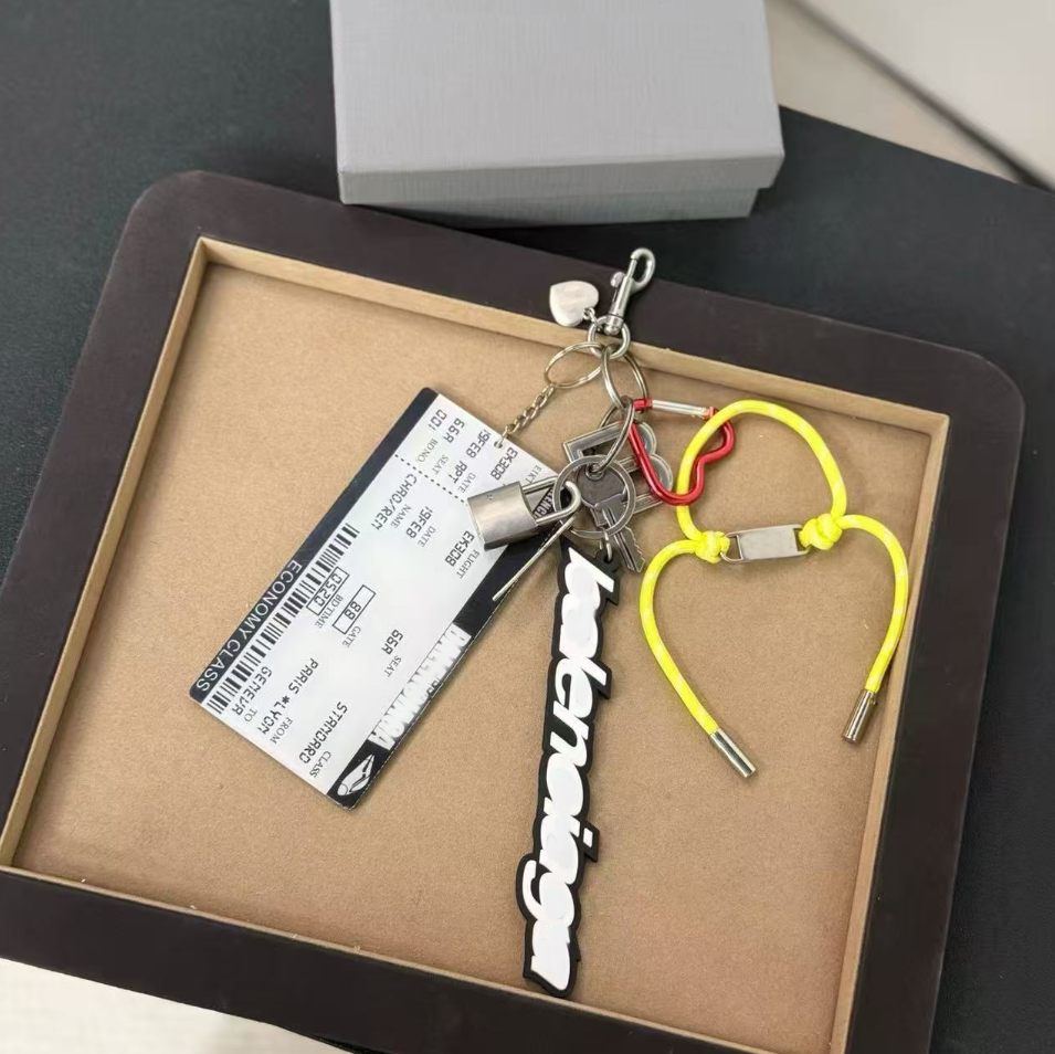 Nouveau billet d'avion dans le sac porte-clés lanières charme chaîne de verrouillage en métal lettre rodéo porte-clés en cuir sac à main sac à ma