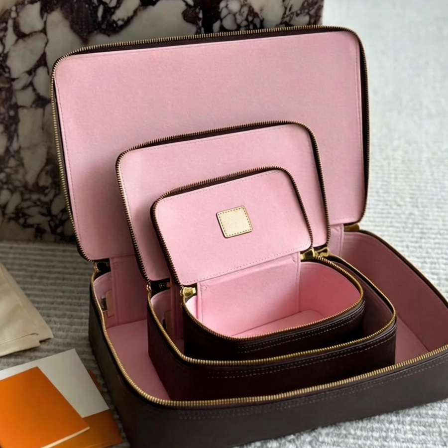 Boîte à bijoux de créateur Sacs à cosmétiques unisexes Sac de maquillage monogramme de luxe Boîtes à bagues en cuir avec motif de lettre Boîtes à