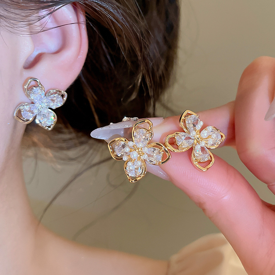 Elegant Four Leaf Hollow Flower Earrings - Niche Style Jewelry for Women-image-1099547257