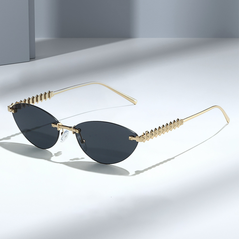High Quality New fashion European American cat-eye sunglasses metal frameless design, unique frame men women, suitable for outdoor street photograph
