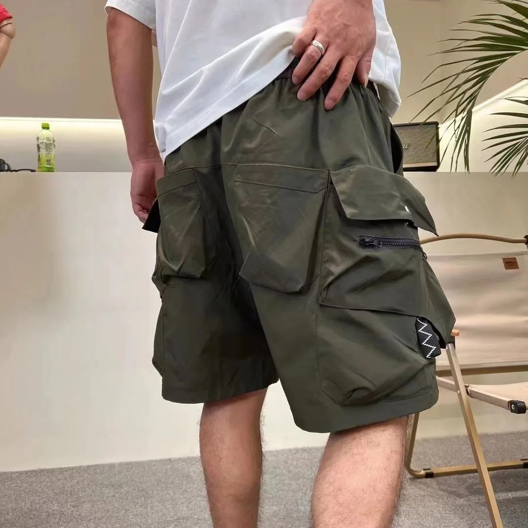 Summer Fashion Solid Color American Style Cargo Multipocket Shorts Mens Casual Loose Sports Plus Size High Quality 260430