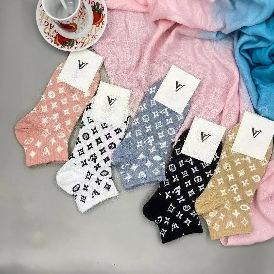 5 pairs of new launched wholesale men's and women's marine socks. Fashionable short calf cotton socks. college style socks suitable for ca