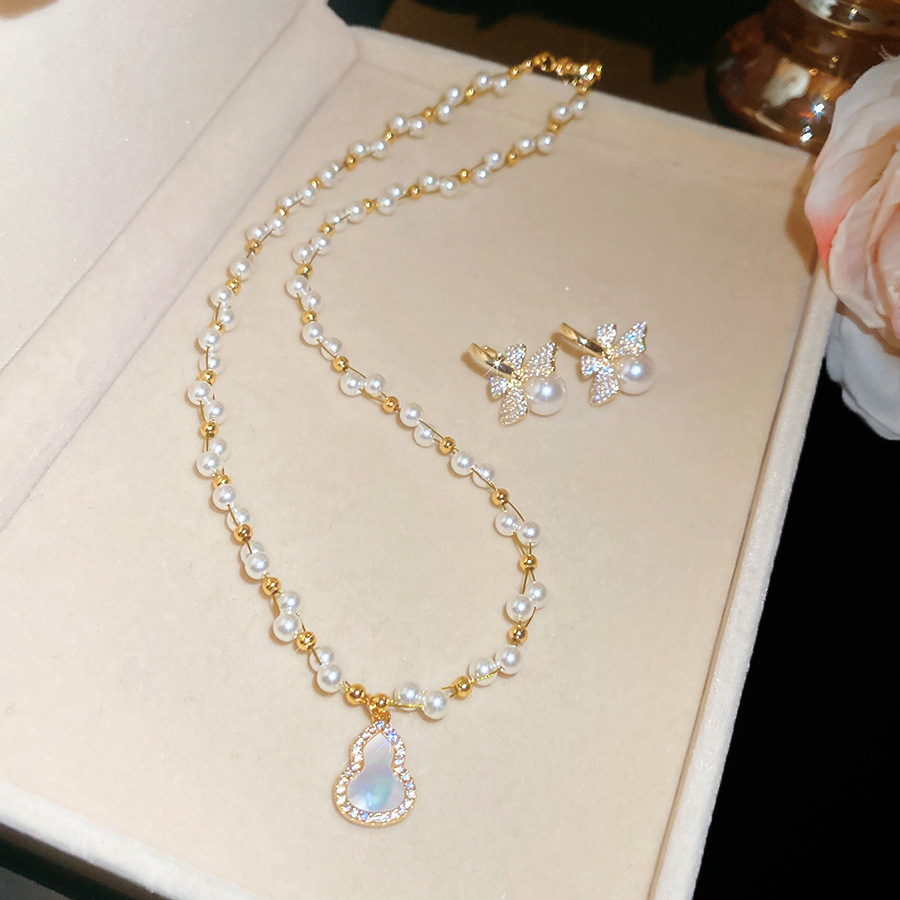 French vintage silver needle zircon bow pearl earring and necklace set 2026 new light luxury high-end jewelry