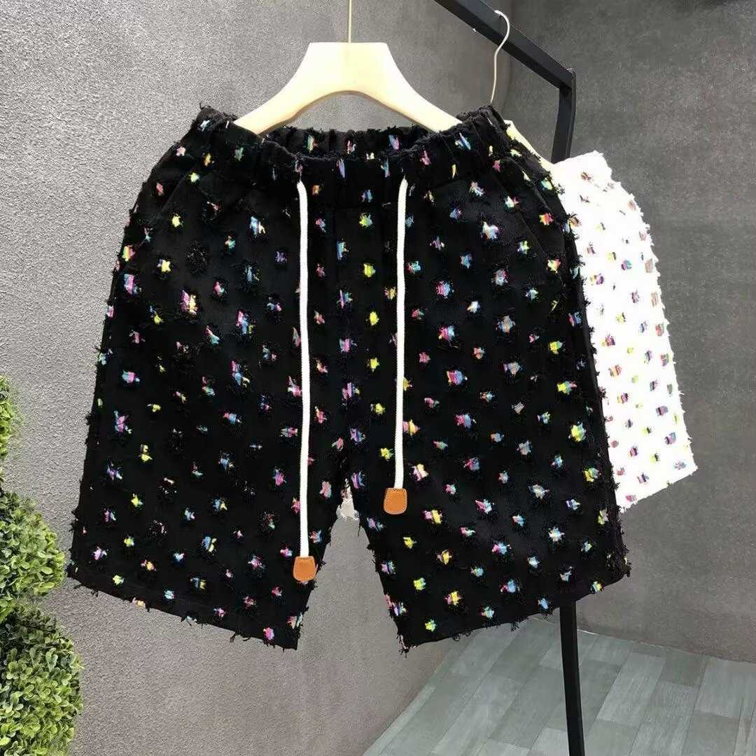 High quality light luxury casual for men 2025 summer new style unique and stylish pumpkin design loose fitting mid length beach shorts