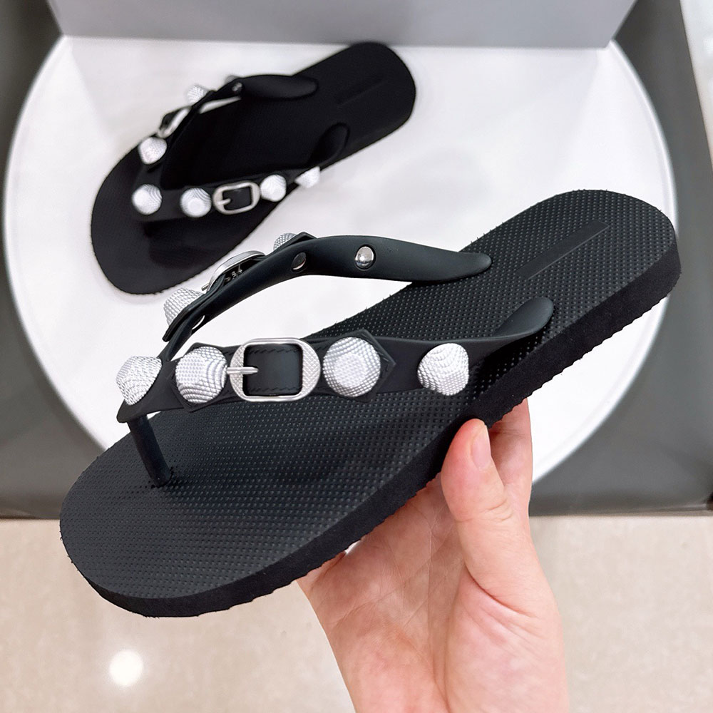 Womens Cagole Thong Sandal in Black designer sandals 784853W recycled rubber thong sandal Silver studs and buckles on the upper summer beach flip fl