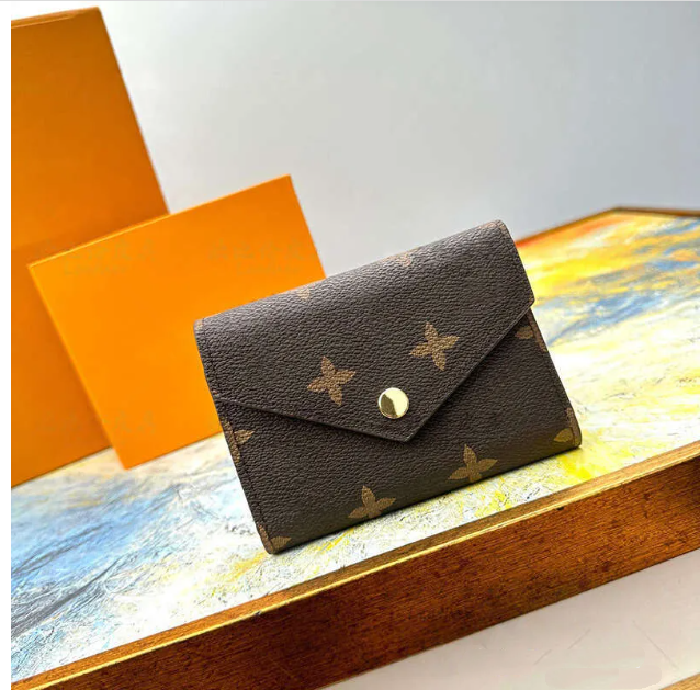 luxury letter patterned canvas envelope wallet, fashionable foldable card bag with snap closure, classic brown small bag with multiple card slots fo