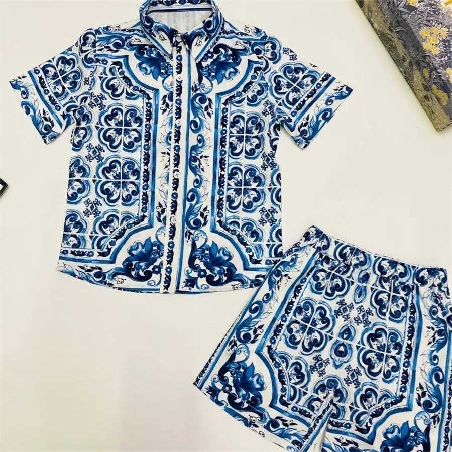 High end childrens clothing factory wholesale 2024 summer new boy swim wear childrens sports shirt shorts 2pcs set blue flower L260508