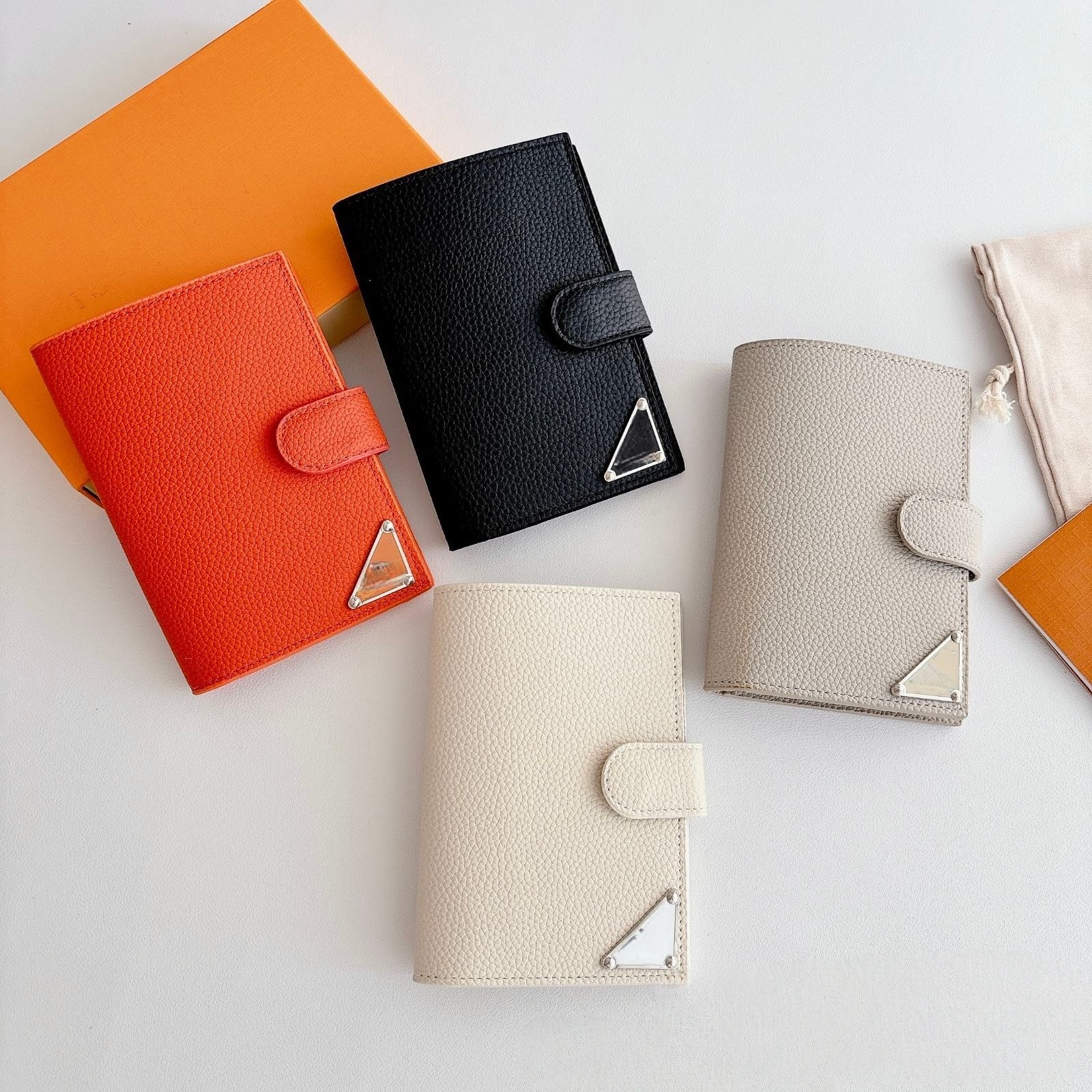 26FW tendance marque Litchi Texture porte-passeport carte de luxe léger double face double face couleur unie minimaliste avancé sac à clés en cui
