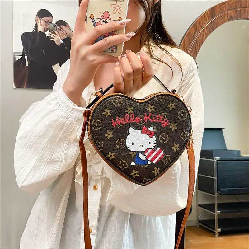 Kawaii Hello Kitty Heart Shaped Bag Trendy European Versatile Shoulder Bag Cute Peach Heart Casual Crossbody Bag L260930