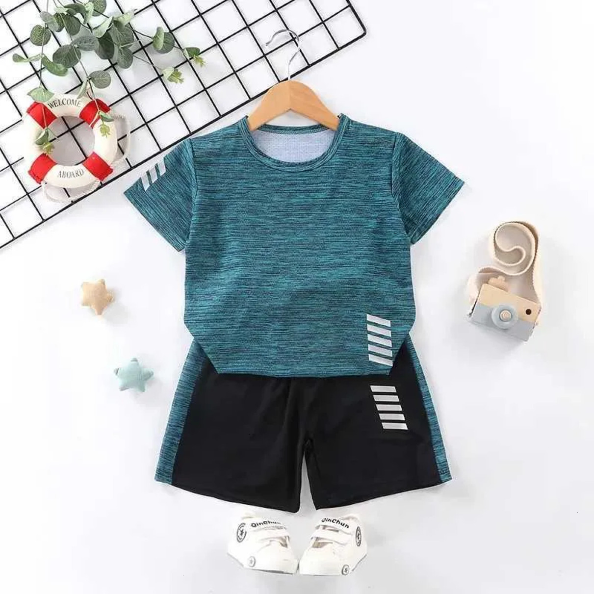 Designer 2026 Clothing Baby Summer Kids Clothes Boys Girls Tracksuit Quick baby Drying TShirt Baby And Shorts 2Pcs Sets Side Striped Ventilat Y26062