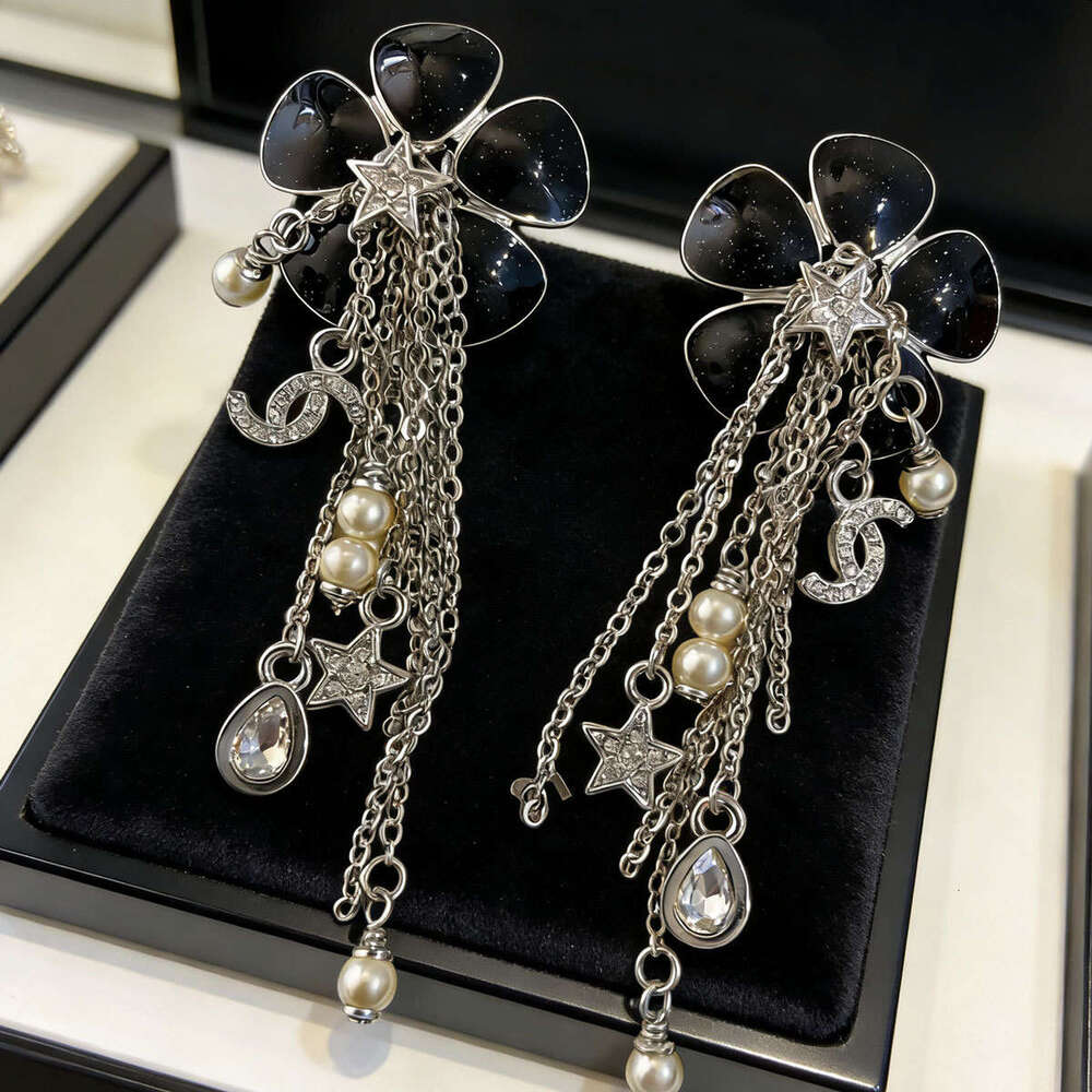 26 new styles of camellia in -inspired design, European and American unique minimalist style, niche high-end exaggerated earrings for women