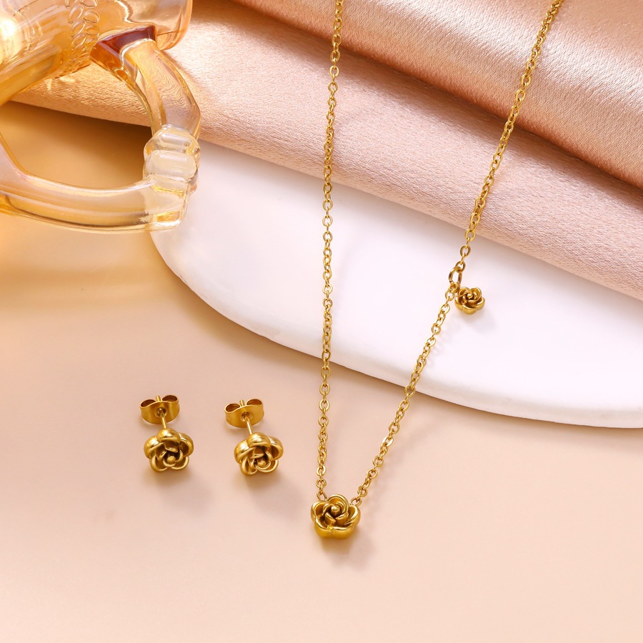 Trendy new three-dimensional camellia necklace and earring set for women, unique design with rose pendant, stainless steel jewelry