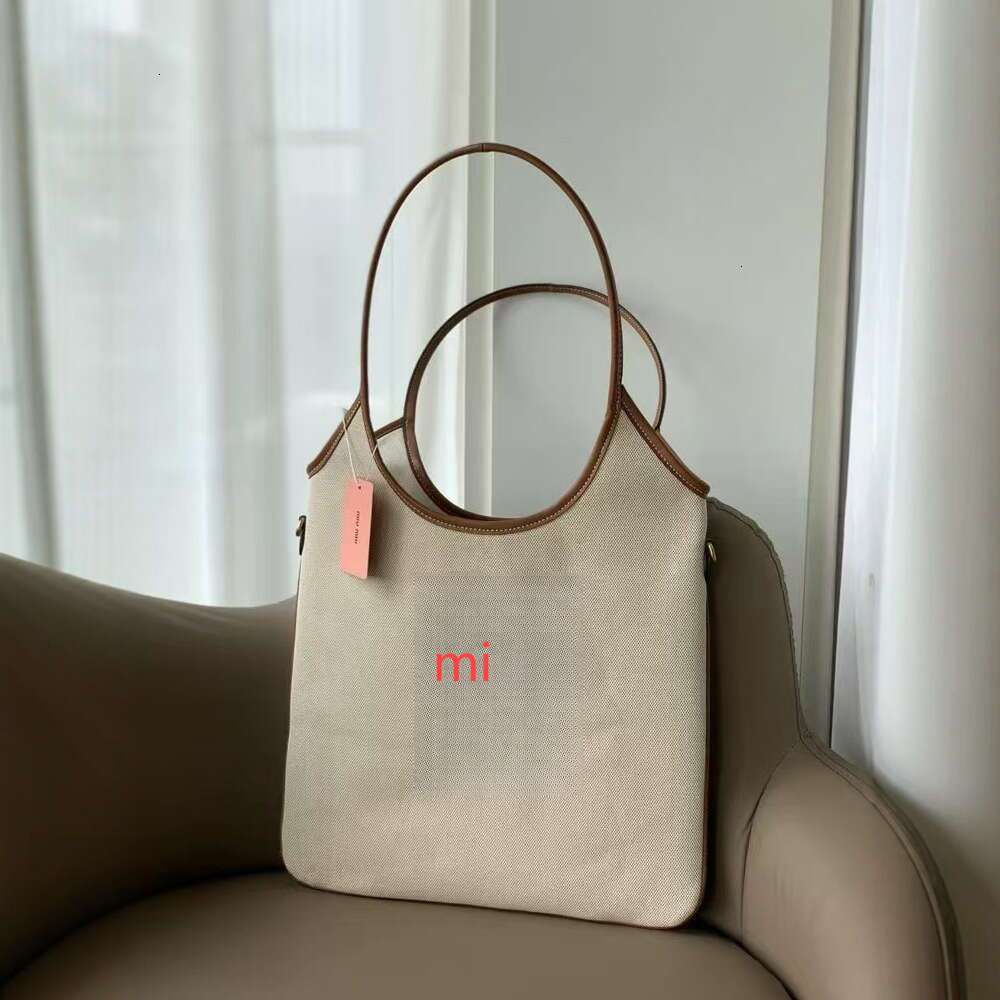 M Letter Mi Designer Bag Embroidered Logo New Tote Bag Lazy Style Vertical Shopping Bag Light Luxury Versatile Single Shoulder Armpit Commuting Bag