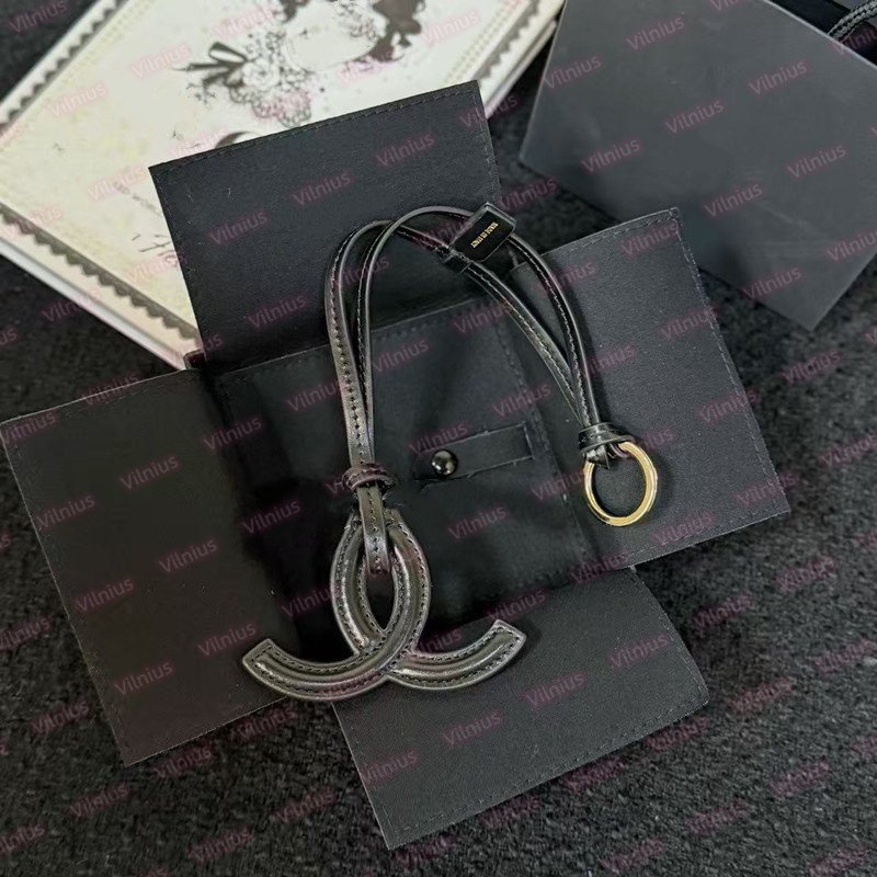 Black Leather CC Logo Bag Charm Keychain Designer Luxury Style Keychain Pendant for Women Channel Phone Straps Charms Accessory-image-1106821755