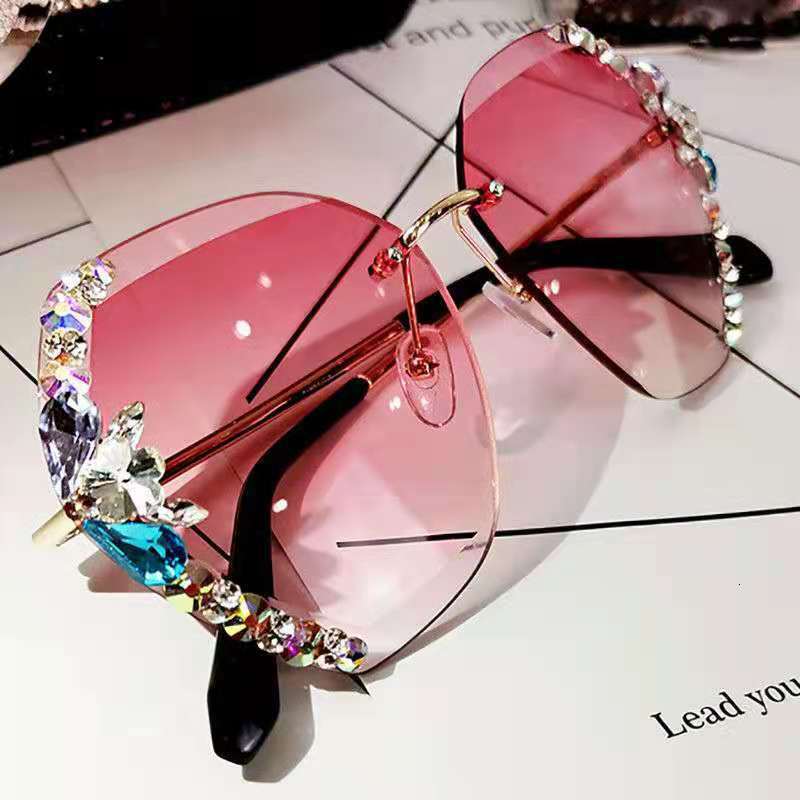 Sunglasses Designer Sunglasses Luxury Women New eyewear shades Cycling Beach Travel Sunscreen And UV Protection High End Frameless Water Diamond Inl