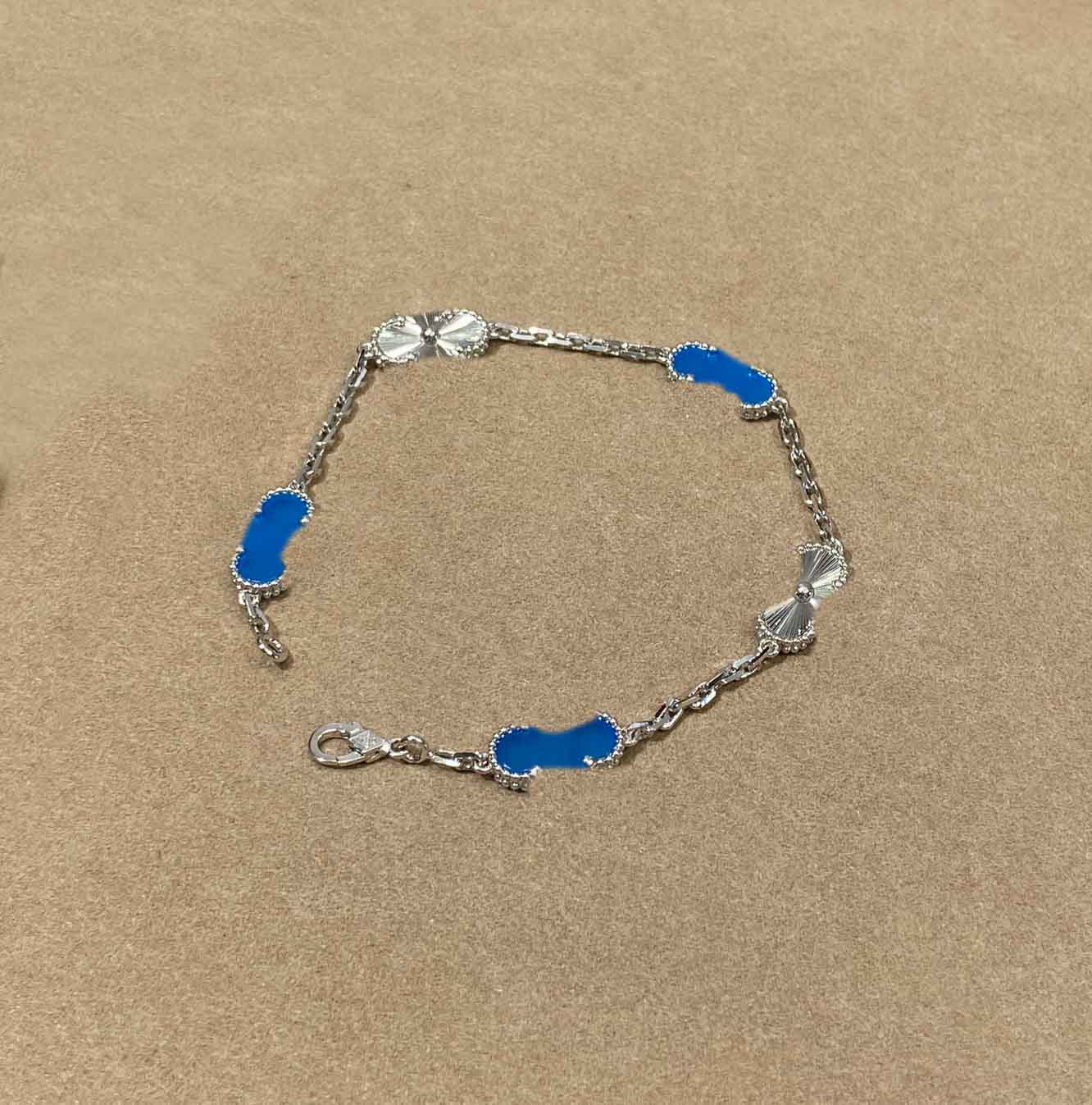 V gold material Luxury quality charm bracelet with blue color in silver plated have stamp box five flower shape 10pcs pendant necklace PS6685A