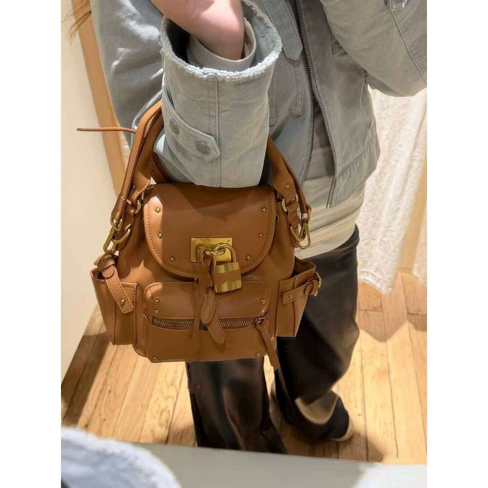 Backpack 2026 New Niche Design Retro Versatile Lock Bag Studded Model High outdoor End Commuter Handbag Backpack Sports