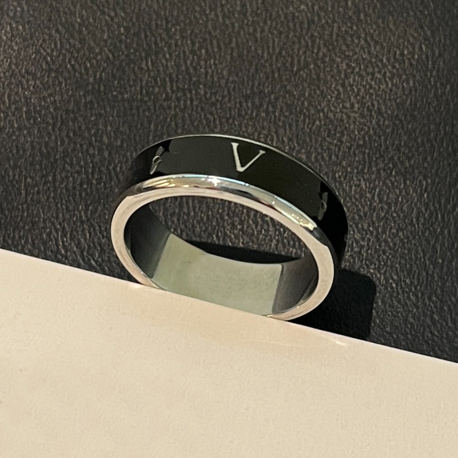 Designer Black Enamel Engraved Ring Designer Silver Band Ring Luxury Unisex Fashion Statement Jewelry Gifts for Women Men Daily Wear..