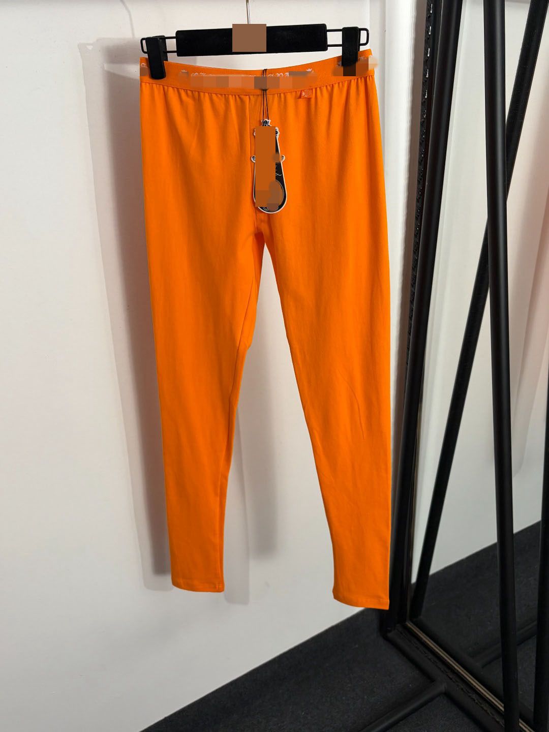Envío gratis pantalones y capri de mujer 2026 estampado floral con letras rosa negro naranja estilo de marca DH572