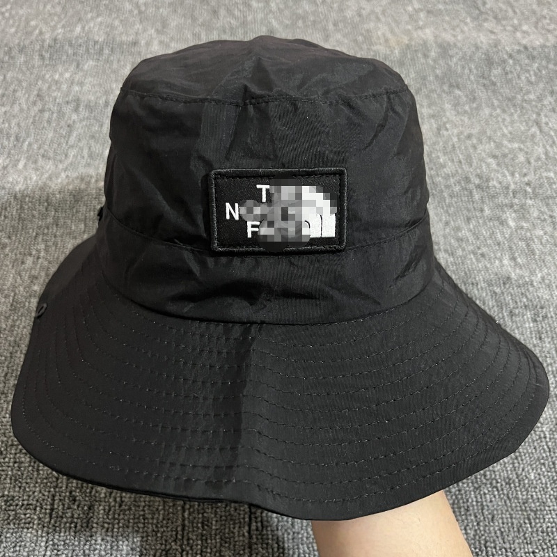 Lichtgewicht opvouwbare nylon emmerhoed Anti-UV ademend visserspet Geborduurd logo Windband Zonnehoed voor heren Dames Vissen Reizen Strand Wandelen