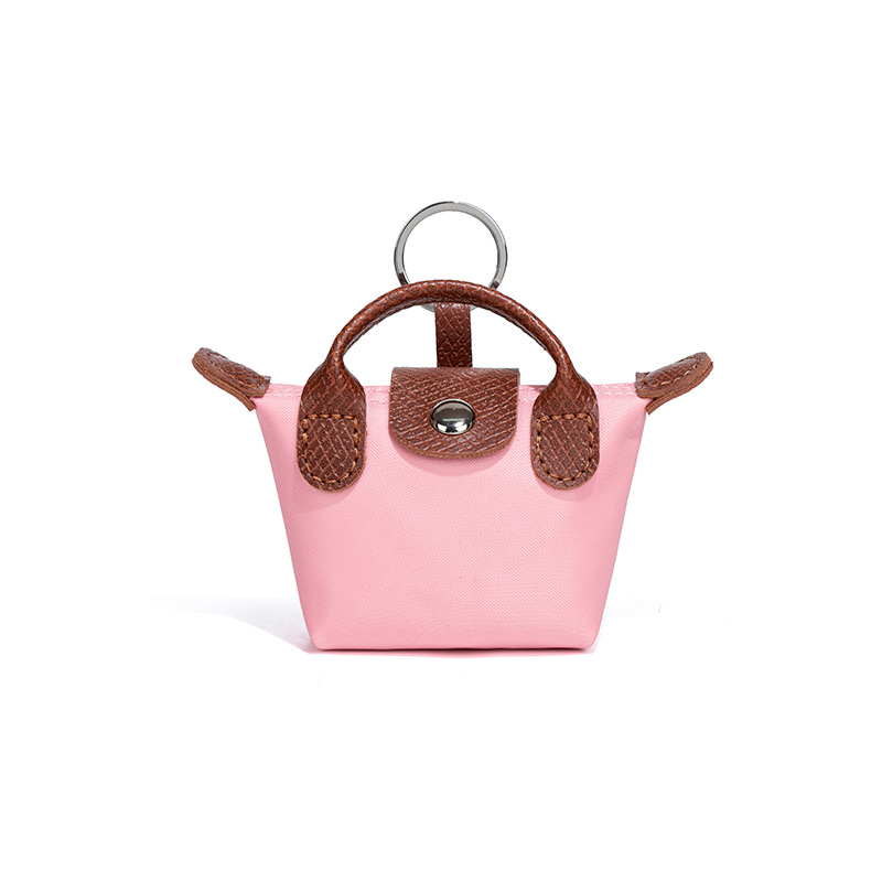 Free shipping 2026s new stylish simple mini dumpling bag versatile portable coin purse earphone bag key holder bag multiple colors hot sale