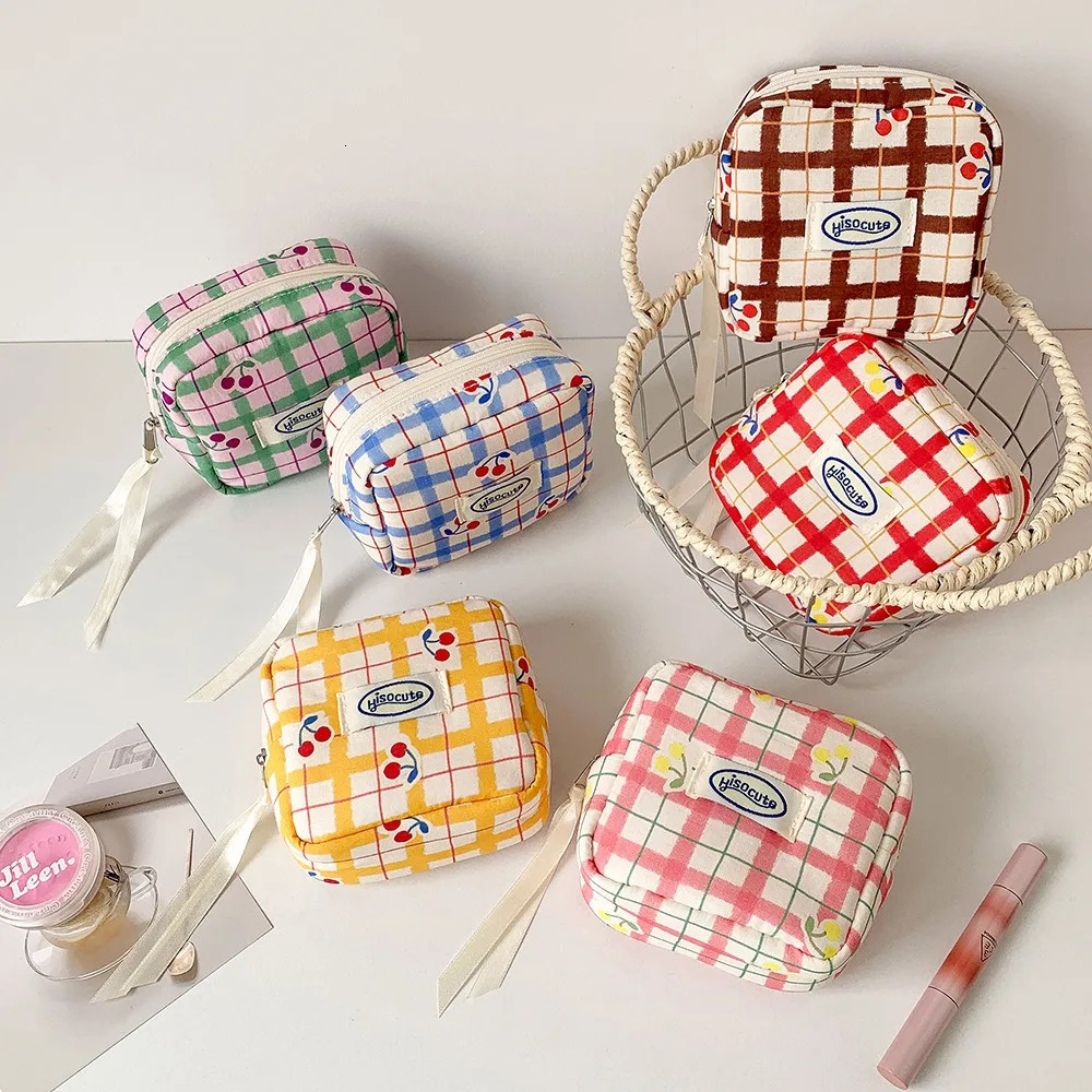 Korean version of large plaid cosmetic bag high value small cherry sanitary napkin portable mini storage bag bluetooth headset b 260629BJ