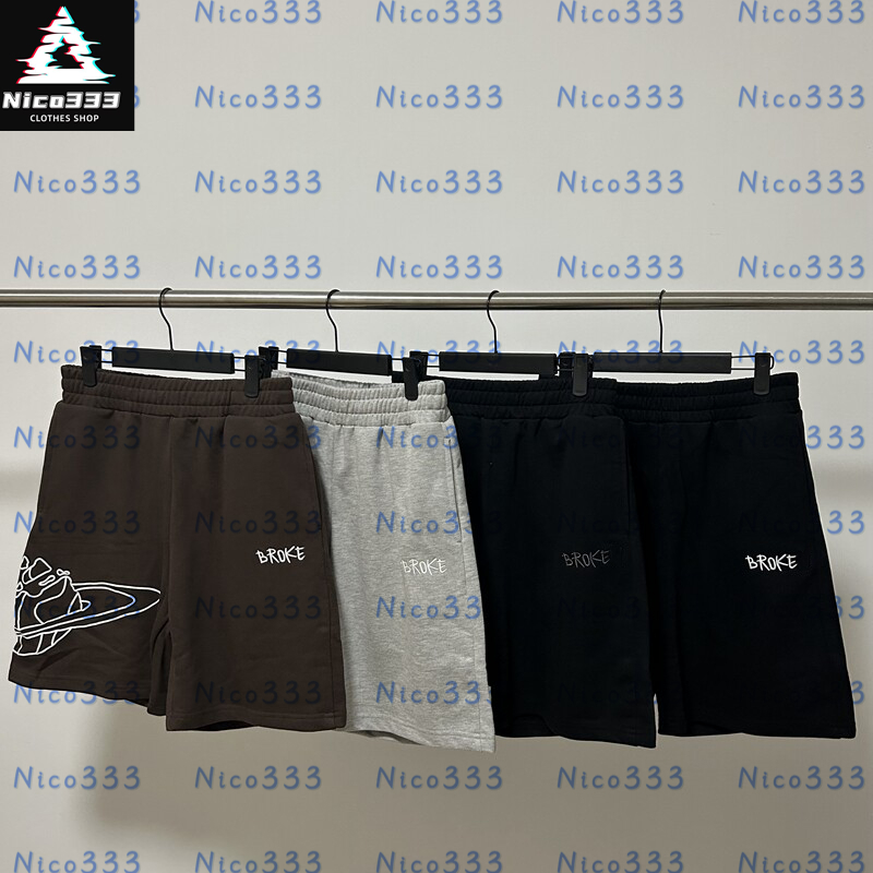 Broke Planett Lettres brodées logo coton ample noir gris marron minimaliste unisexe short décontracté droit