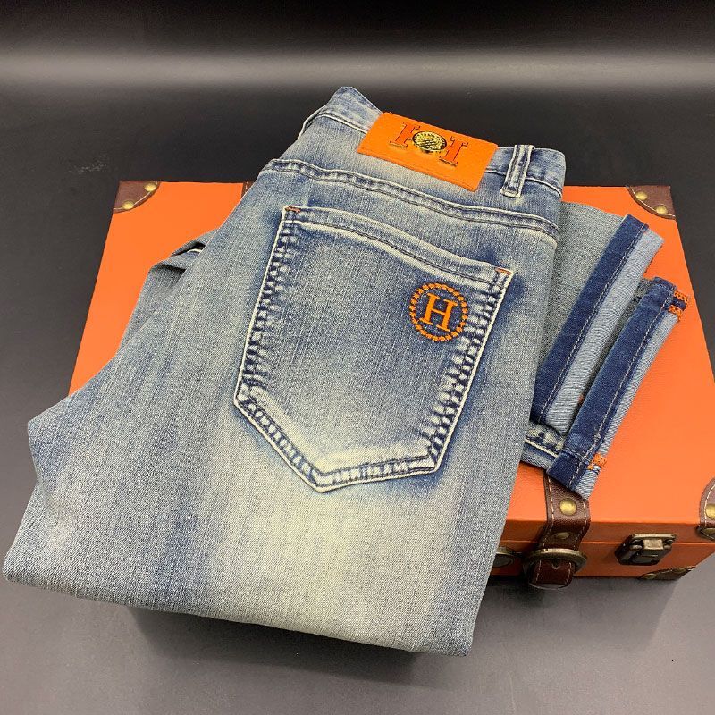 High-end fashionable blue stylish men's cropped jeans, versatile trendy washed solid color light luxury slim-fit pants