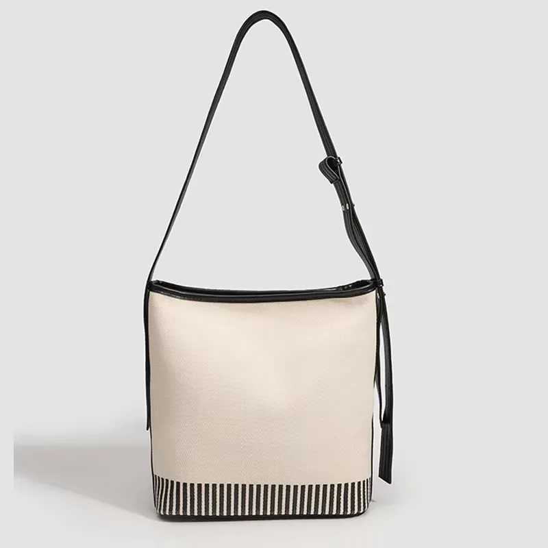 Womens Fashionable Summer 2025 New Large Capacity High end Canva Spliced Lightweight Commuting Single Shoulder Bucket Bag X260706
