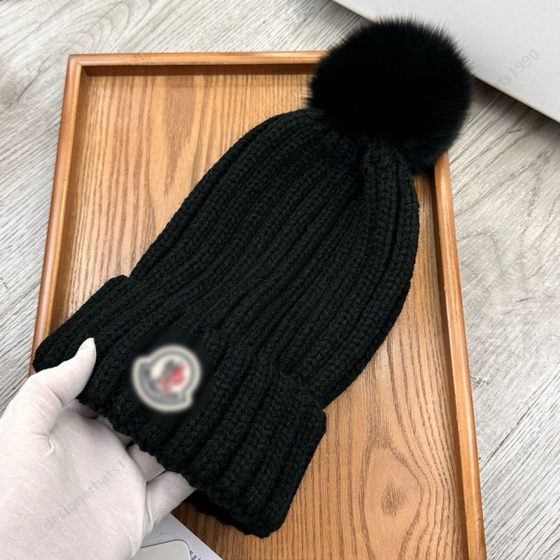 Designer beanie without brim - a warm winter knit hat, stylish and classic with fluffy pompoms. This beanie is a bestseller for women's clothin