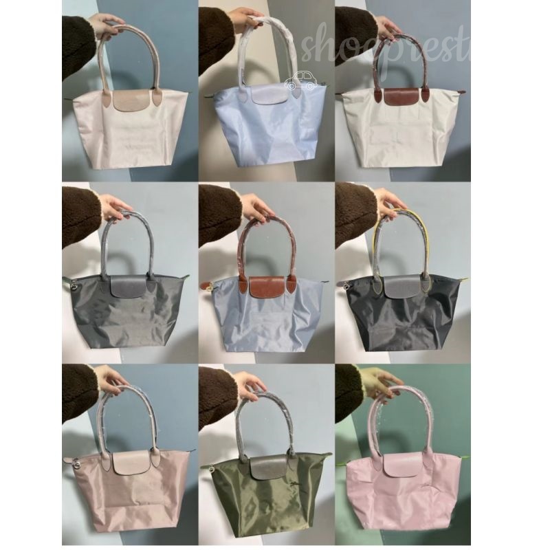 2026 high quality Designer Luxury Brand Bolso de bolso gran capacidad para computadora playa viajero nylon lienzo casual bolsa con cremallera fjhx