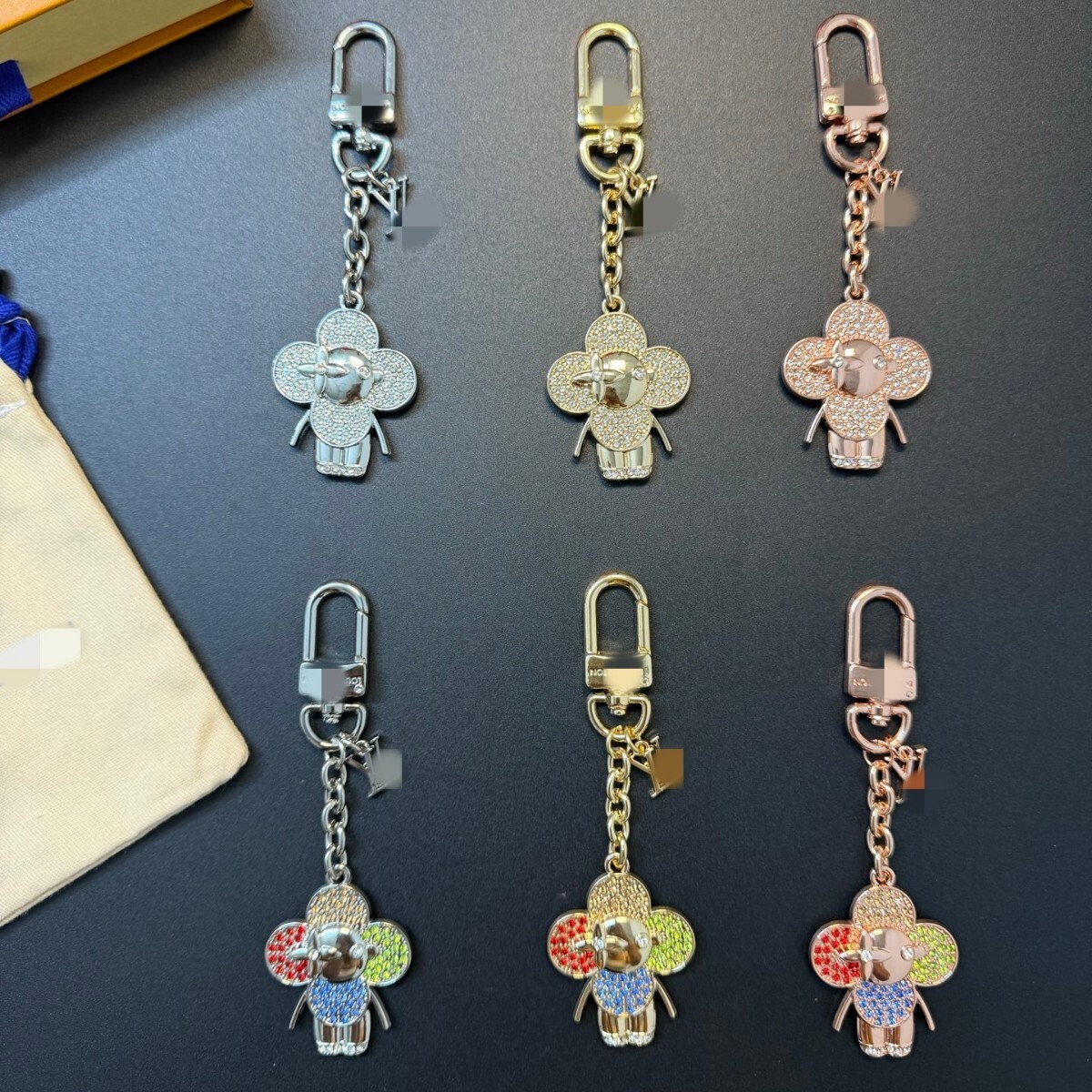 Keychains Lanyards L-shaped women bag new model from key chain starry sky pattern designer bag charms luxury doll pendant fashion keychain accessori