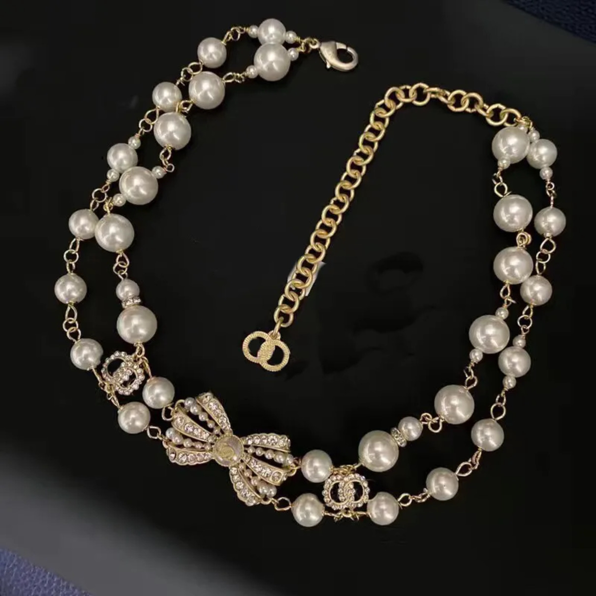 2026 Hot Design 12Style Classic Fashion Diamond Pendant Designer High Quality cologne Pearl Women's Necklace perfume Wedding Anniversary Jewelr