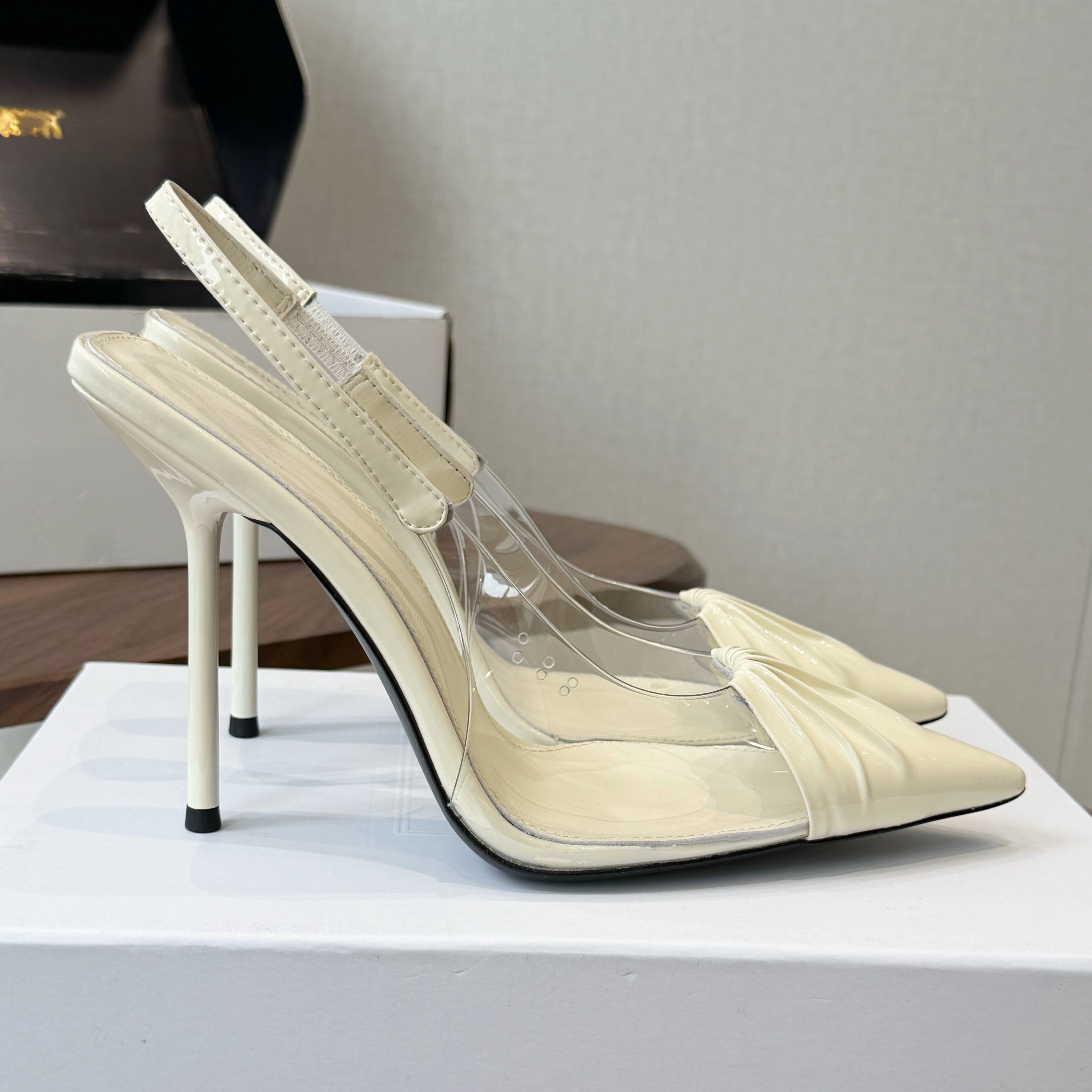 2026 French fashion brand women's leather pleated splicing transparent film anti ultra-fine high-heeled sandals summer fashion versatile single