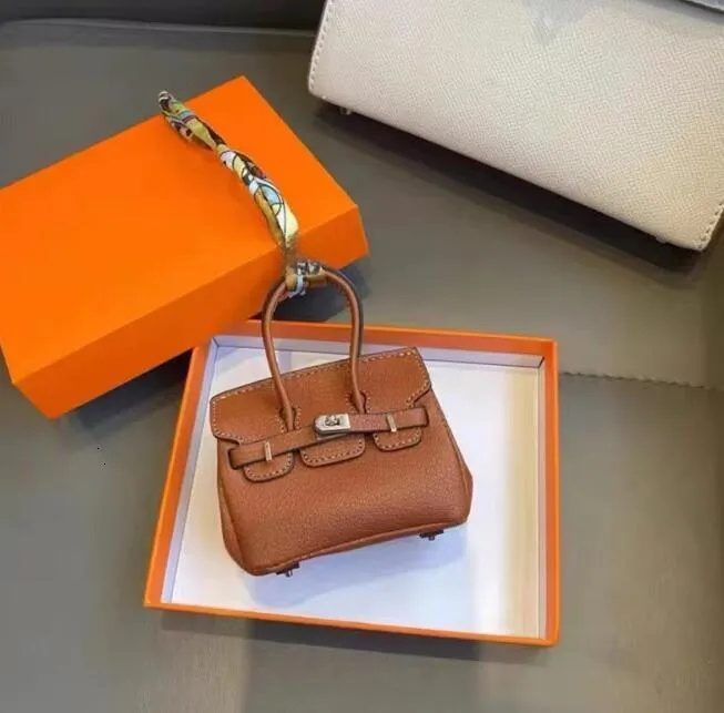 Porte-clés de créateur porte-clés à breloques pour sac porte-clés en cuir fait à la main homme femme Mini portefeuille sacs pendentif pièces de m