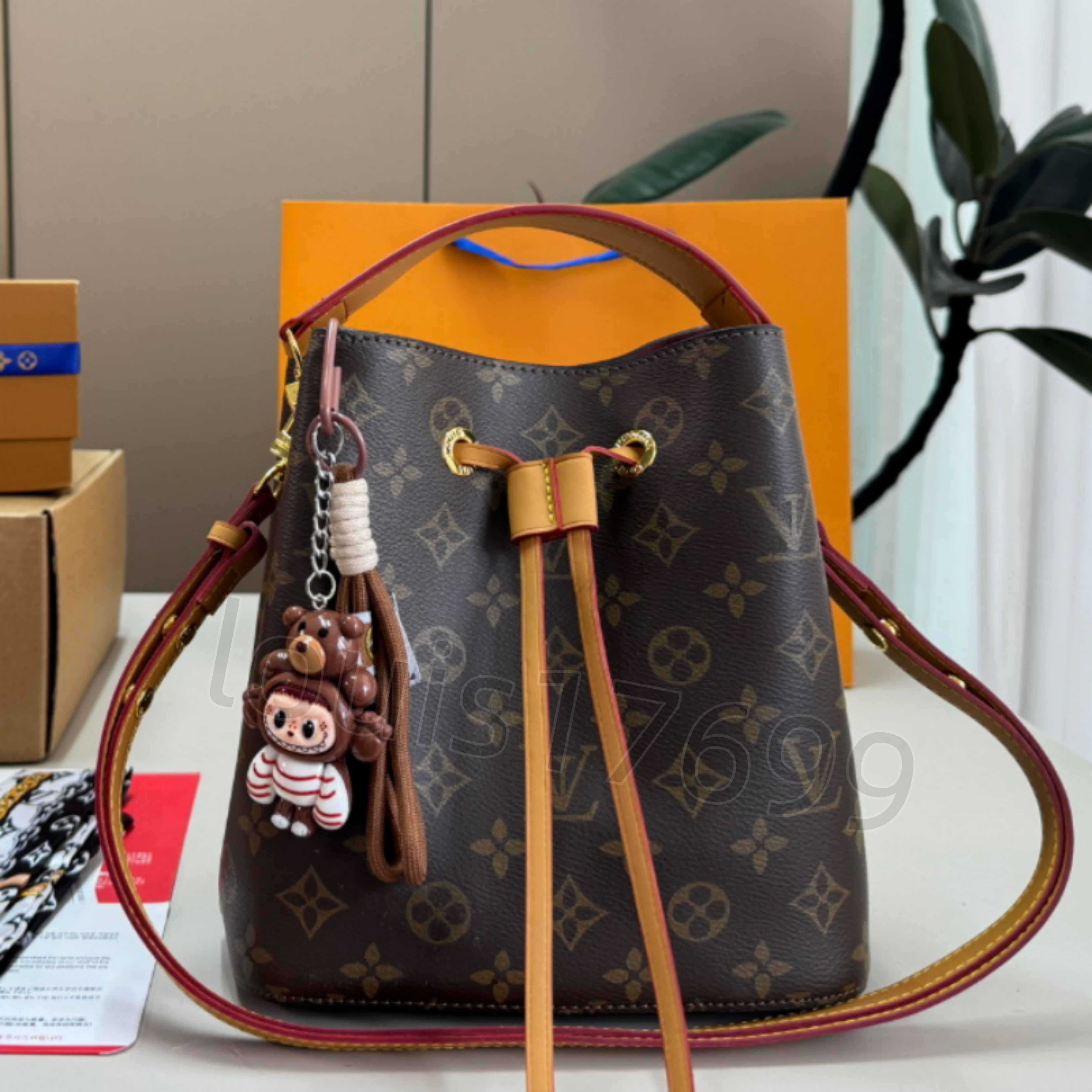 Women Neonoe Black Multicolor Print Drawstring Bucket Bag Cute Cartoon Pendant Top Handle Adjustable Leather Crossbody Strap Luxury Designer Shoulde