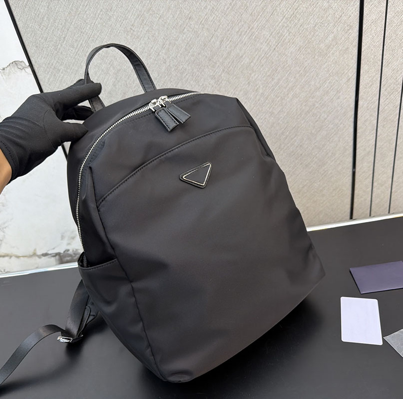 Designer Bags Unisex Black Nylon Backpack Silver Metal Triangle Main Pocket Side Water Bottle Pockets Large Capacity Laptop School Travel Backpack