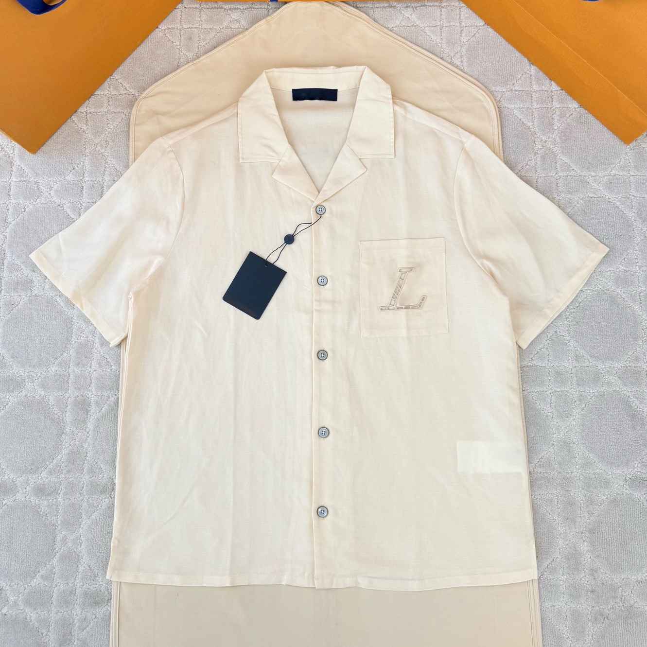 Designer brand high-quality men's shirts with hollowed out embroidered pockets, men's casual shirts, luxurious business short sleeved shir